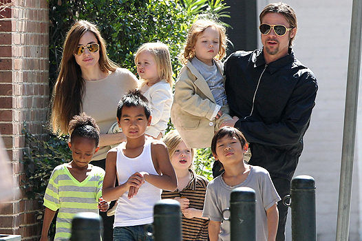 #7006829 The Jolie-Pitt family headed out in New Orleans, Louisiana to do some grocery shopping at a local market on March 20, 2011. Angelina has brought all six children to visit their dad Brad Pitt while he works on his latest project "Cogan's Trade". Maddox, Pax, Zahara and Shiloh walked while the twins Knox and Vivienne hitched a ride from mom and dad who were all smiles while out and about on a lovely sunny day. Brad and Angelina waved to fans as they strolled the street to and from the market. Fame Pictures, Inc - Santa Monica, CA, USA - +1 (310) 395-0500 All Over Press