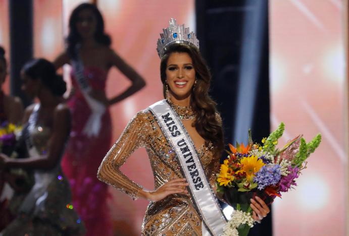 Miss France Iris Mittenaere poses after being declared winner in the 65th Miss Universe beauty pageant at the Mall of Asia Arena, in Pasay, Metro Manila